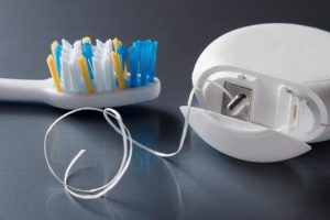 a toothbrush and floss